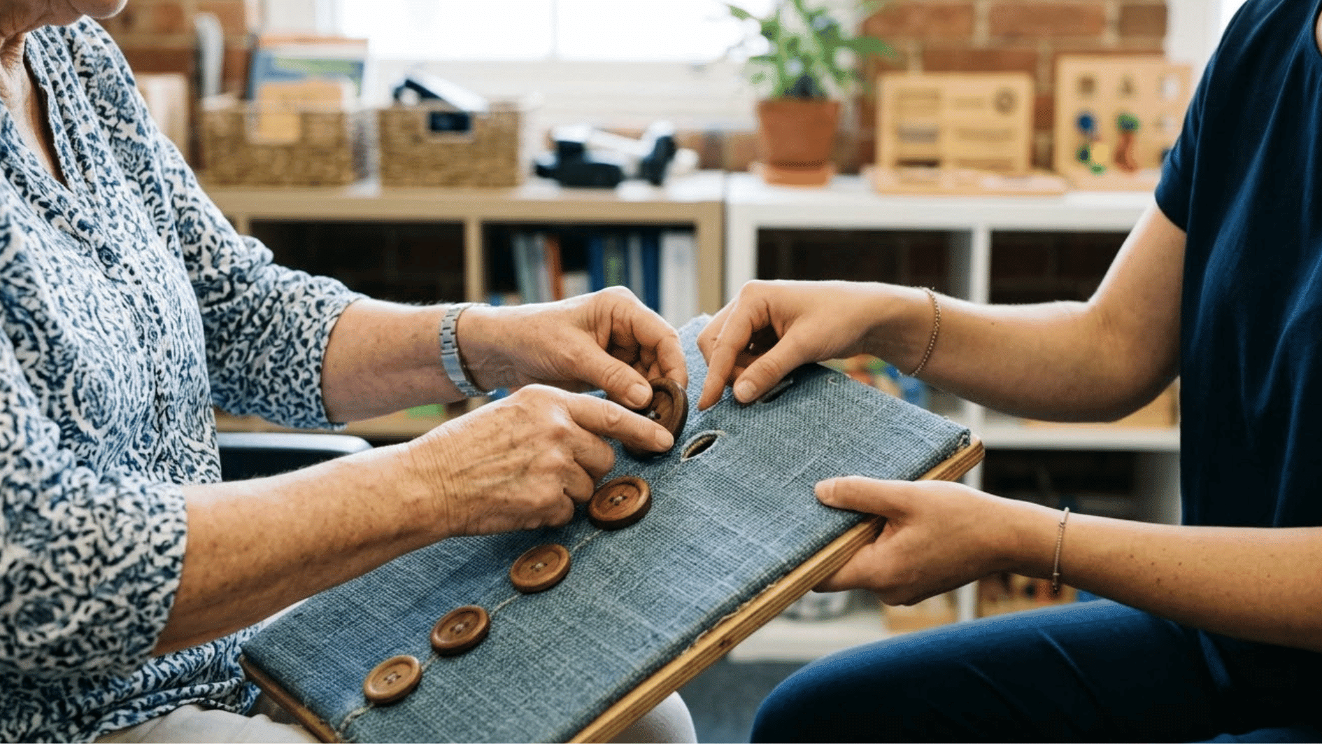 close-up of an occupational therapy session focused on buttoning practice